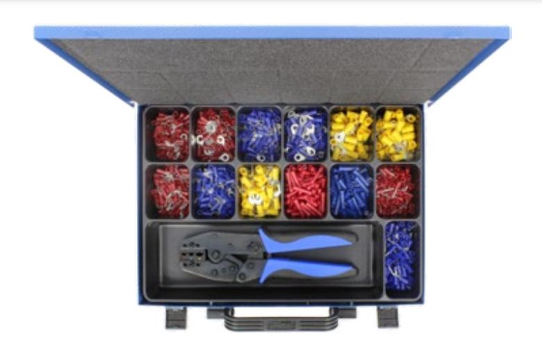 Assortment set of insulated cable lugs with crimping pliers and stripping pliers in a metal box